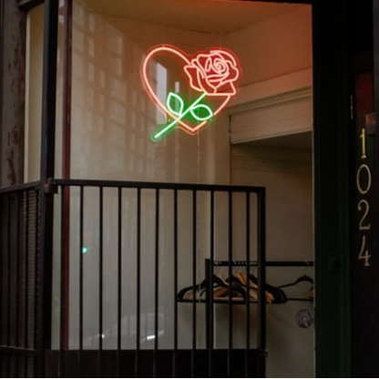 neon rose in the window
